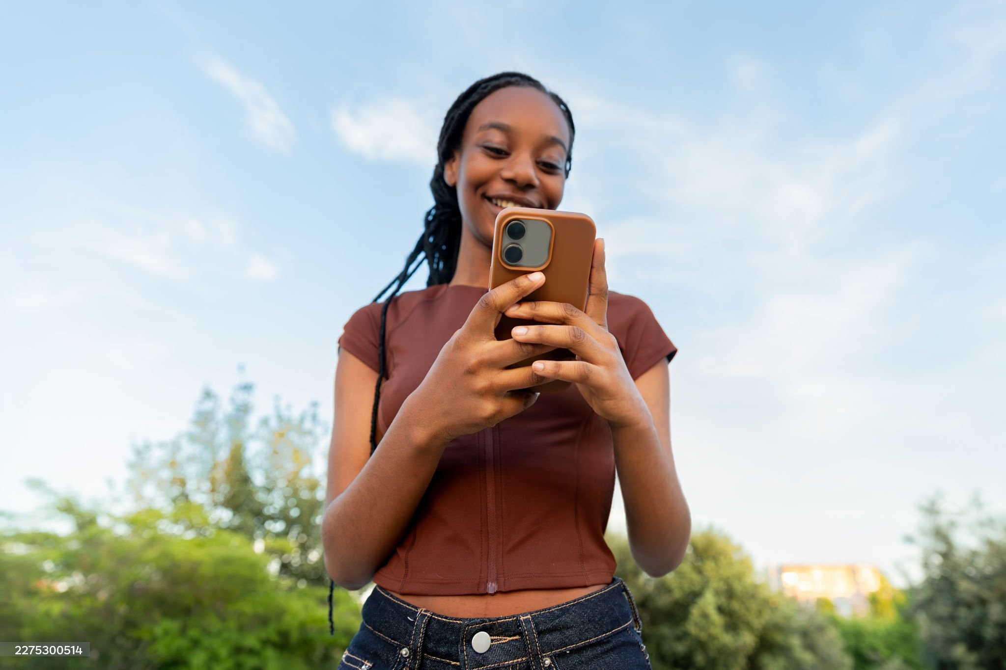 Woman using the Tiki app on her phone